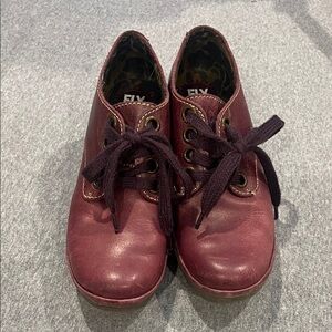Fly London wedge lace up shoes.